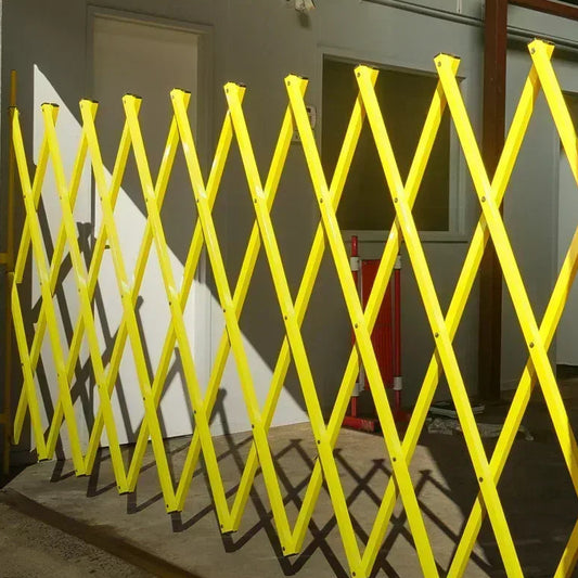 Yellow expandable barrier adjustable scissor gate barrier available for Pedestrian Barrier Rental as well