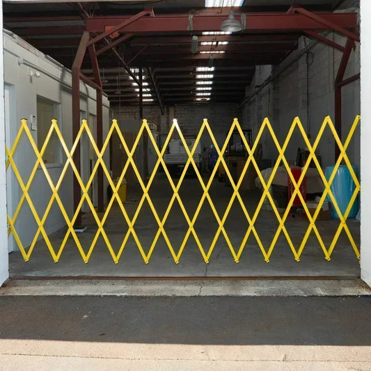 Yellow expandable barrier adjustable scissor gate barrier available for Pedestrian Barrier Rental as well