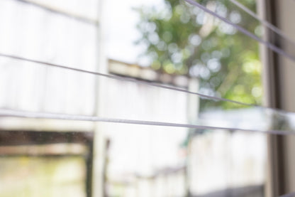Clear Guard transparent window protection installed on residential window