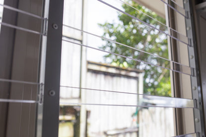 Clear Guard transparent window protection installed on residential window