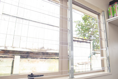 Clear Guard transparent window protection installed on residential window