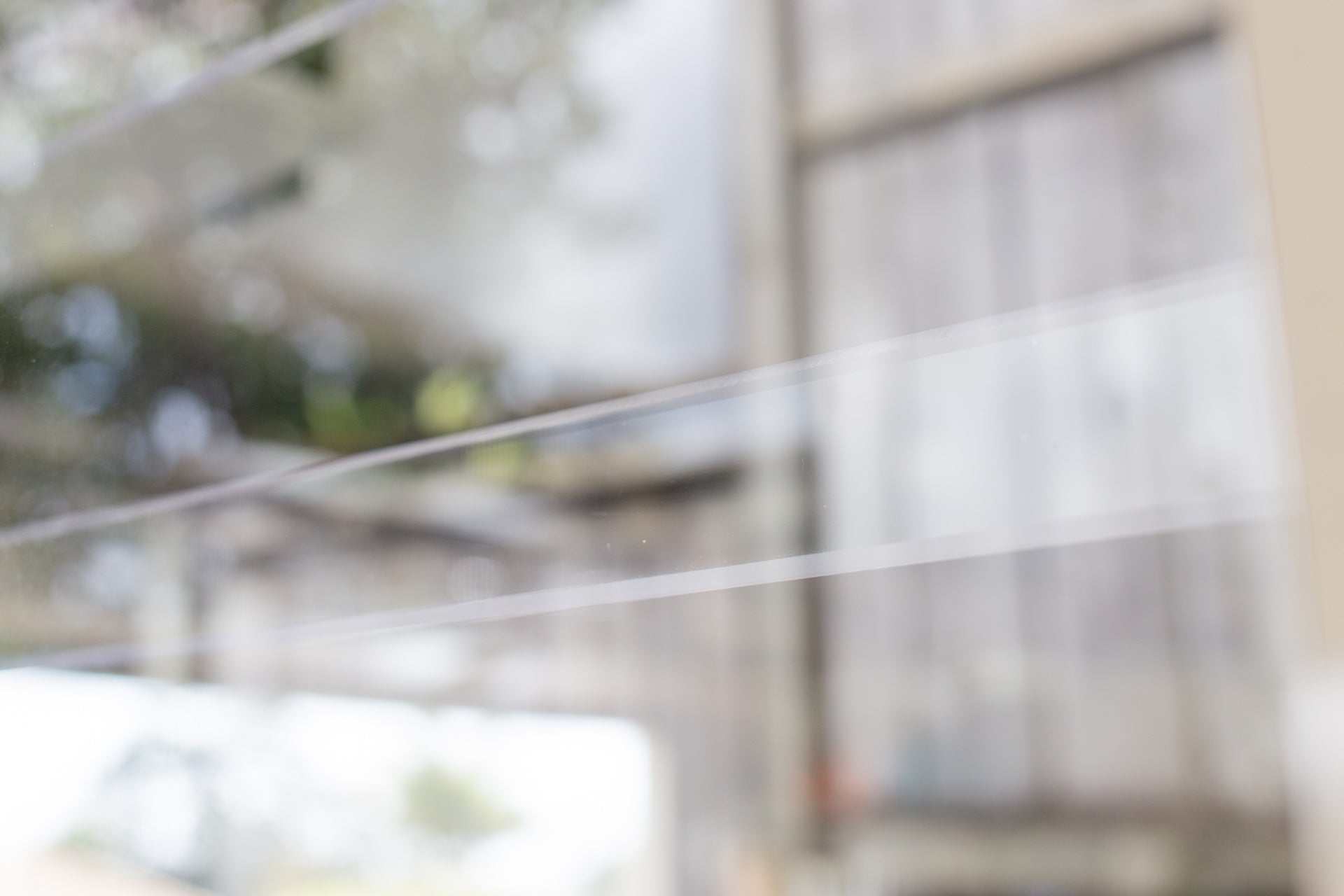 Clear Guard transparent window protection installed on residential window