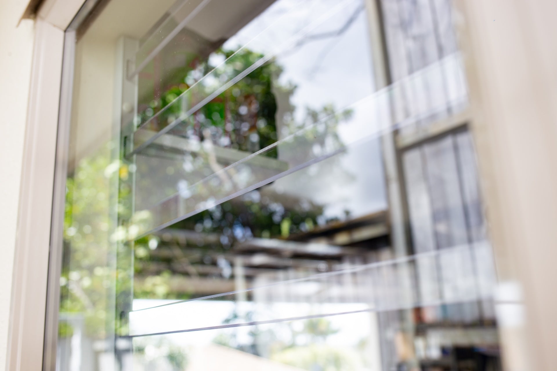 Clear Guard transparent window protection installed on residential window