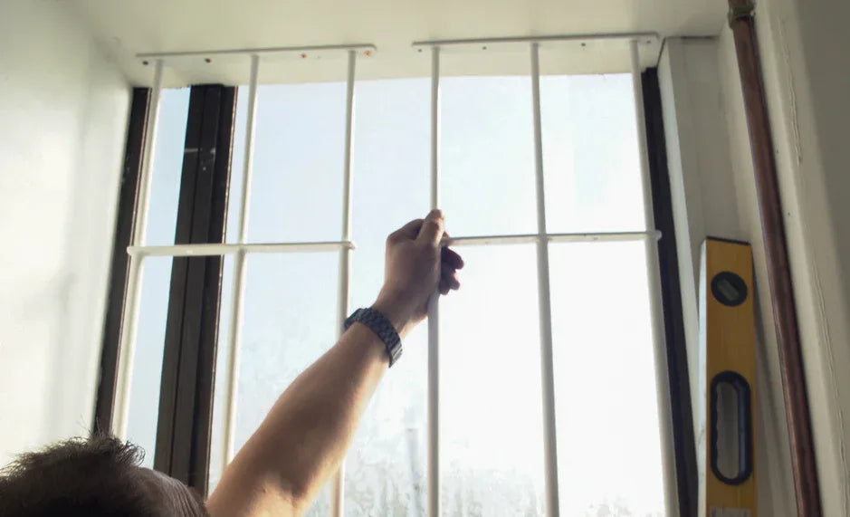 Extendable window bars with 3 round steel security bars for residential window protection
