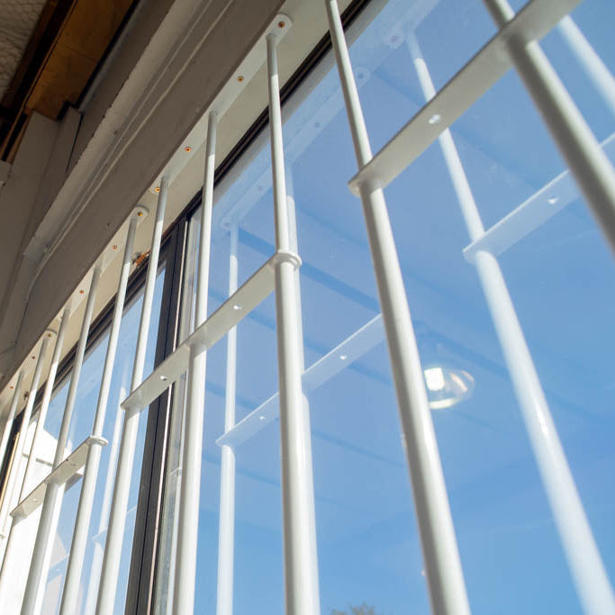 White-round-Window-Bars-Installed